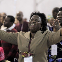 Members of the Redeemed Christian Church of God pray at Redemption Camp in Floyd, Texas, in 2009. The church is on a mission to spread to every city in North America.